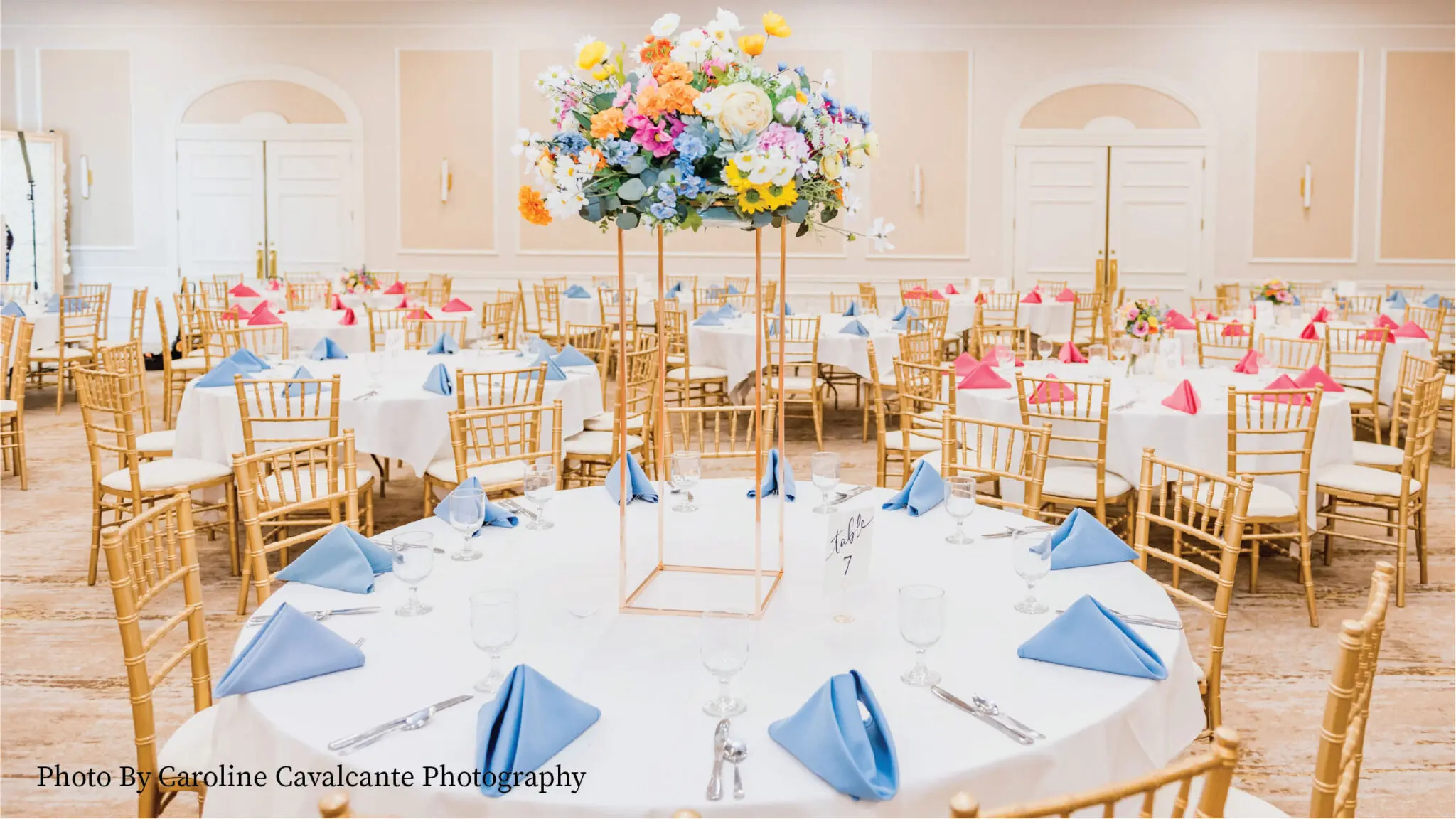 Oakton Ballroom wedding reception with tall floral center pieces and bright spring colors.