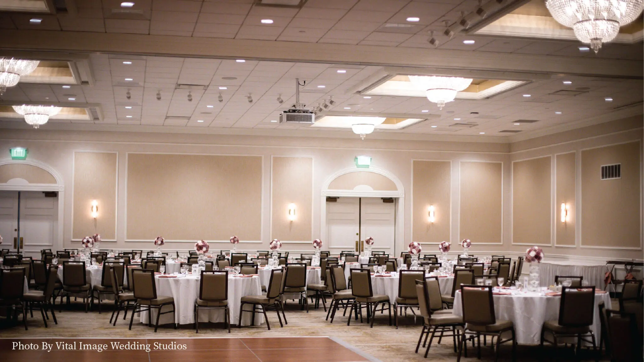 Lake Country Ballroom wedding reception with a dance floor and dim lighting.