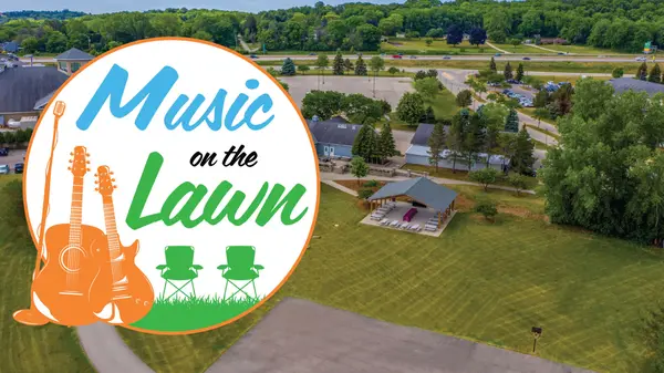 Aerial view of Village Park greenspace with the Music on the Lawn logo overlayed.